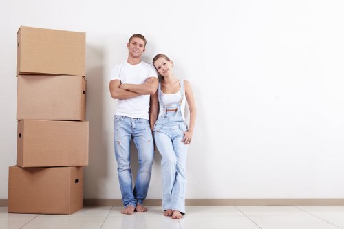 Removal team loading household items for a UK service booking