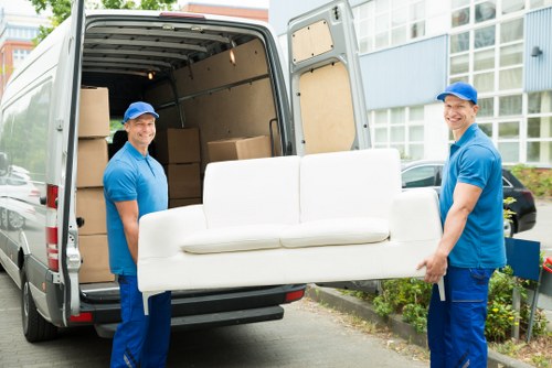 Local movers loading household items for a move in France