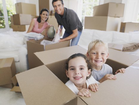 Packed apartment moving scene in a French city