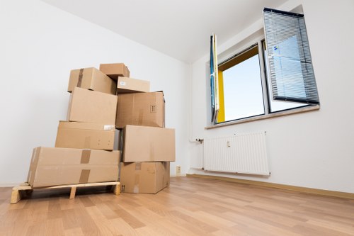Furniture and boxes being arranged inside a moving van