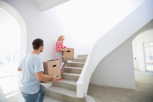 Removal team loading furniture for home relocation